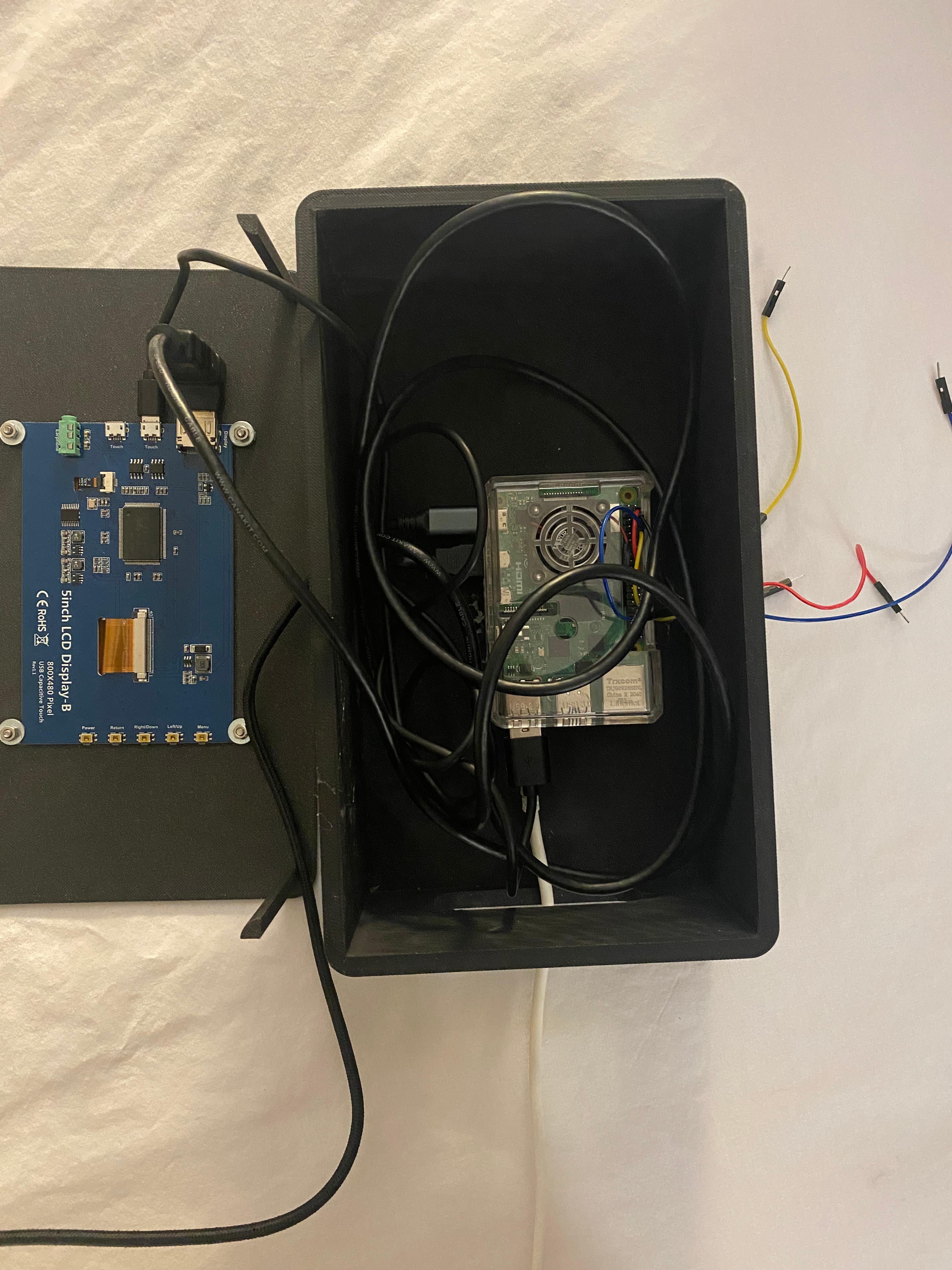 Raspberry Pi case assembly with screen and connections